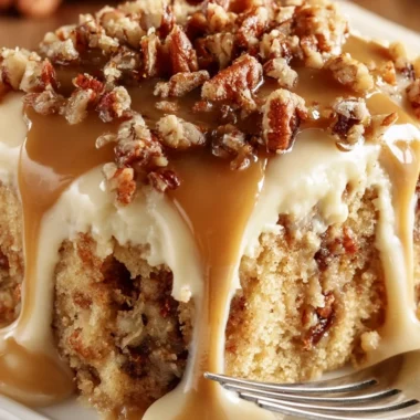 Delicious Butter Pecan Praline Poke Cake Recipe